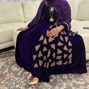 Gown dress velvet febric... 1 piece dress ..very nice dress with golden work...